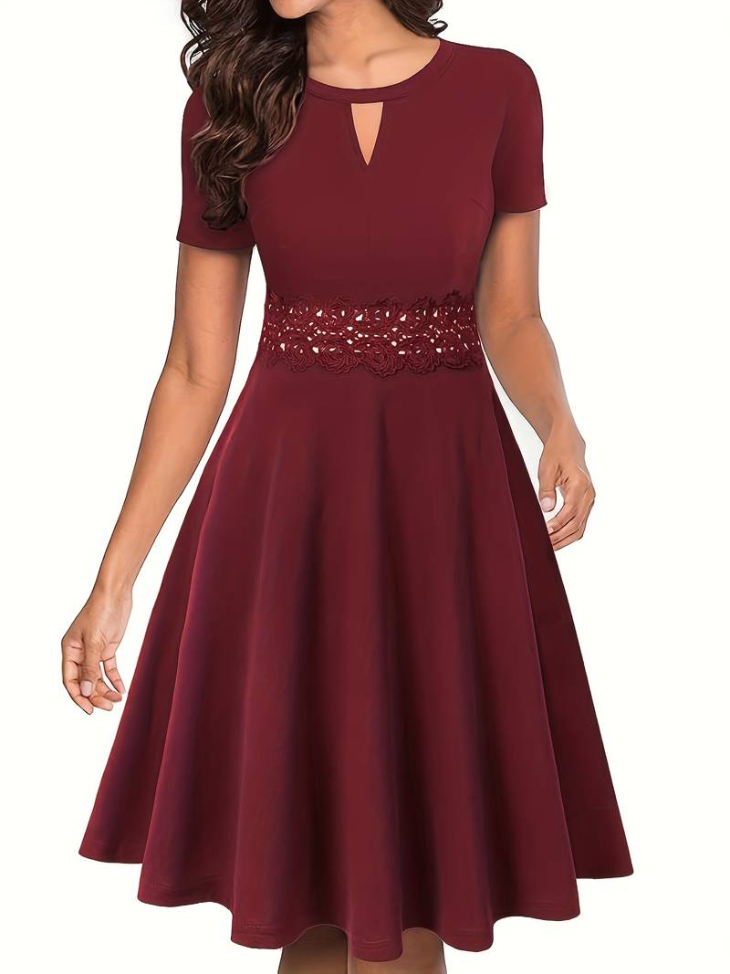 Chic Blue Dress with Lace Accents and Fitted Waist