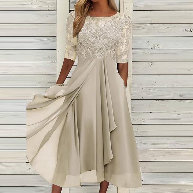 Flowing Summer Dress with a Fluid Midi Silhouette