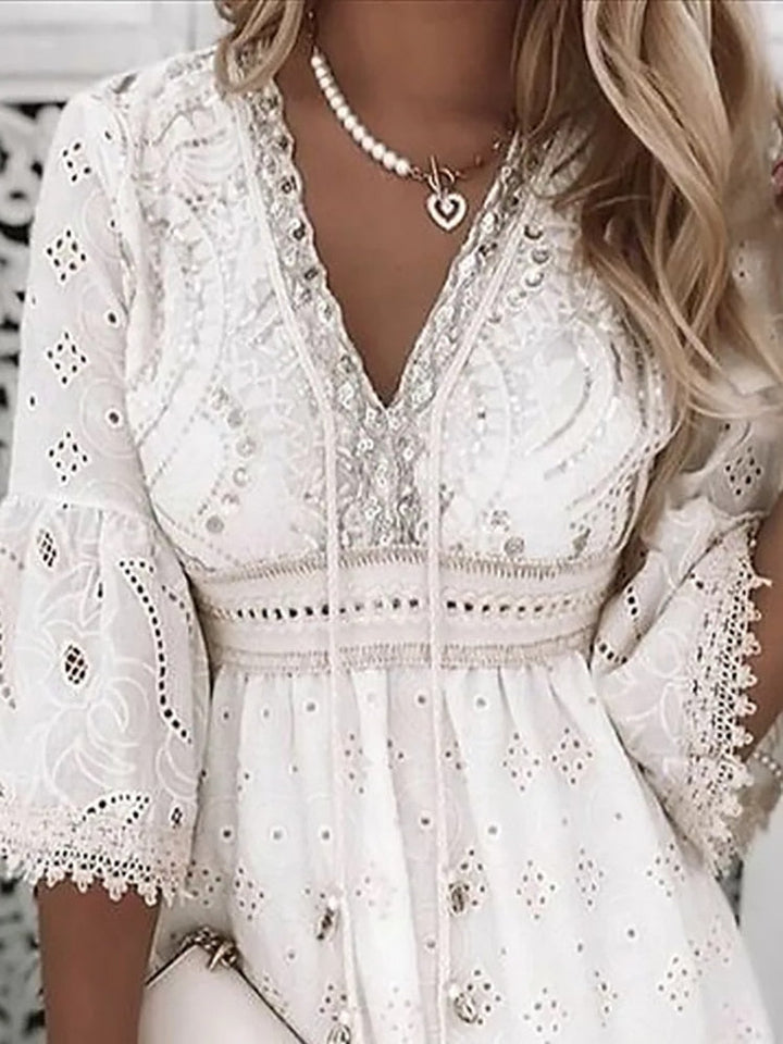 Fluid Boho Dress with Deep V-Neckline and Loose Fit