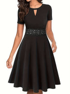 Chic Blue Dress with Lace Accents and Fitted Waist